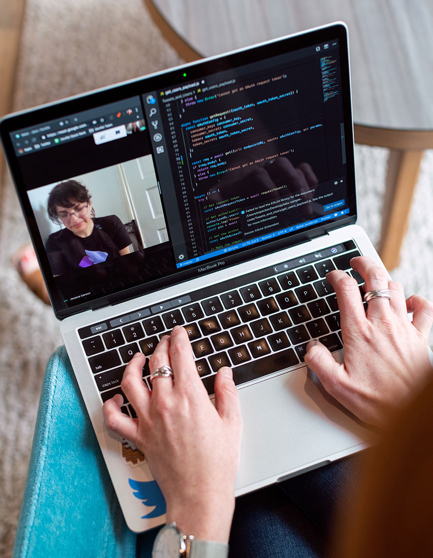 person working on laptop 2 person working on laptop 2
